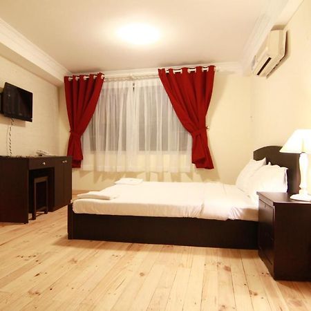 Koniko Backpackers Hostel Ho Si Minh-város Szoba fotó