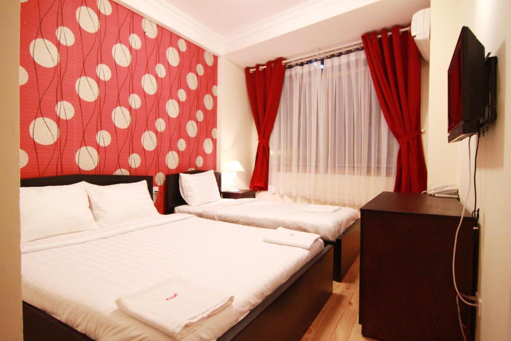 Koniko Backpackers Hostel Ho Si Minh-város Szoba fotó